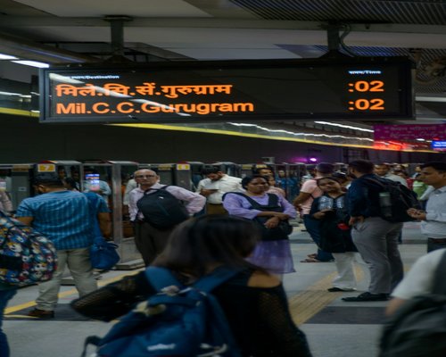 People walking on stairs in an Indian metro station
